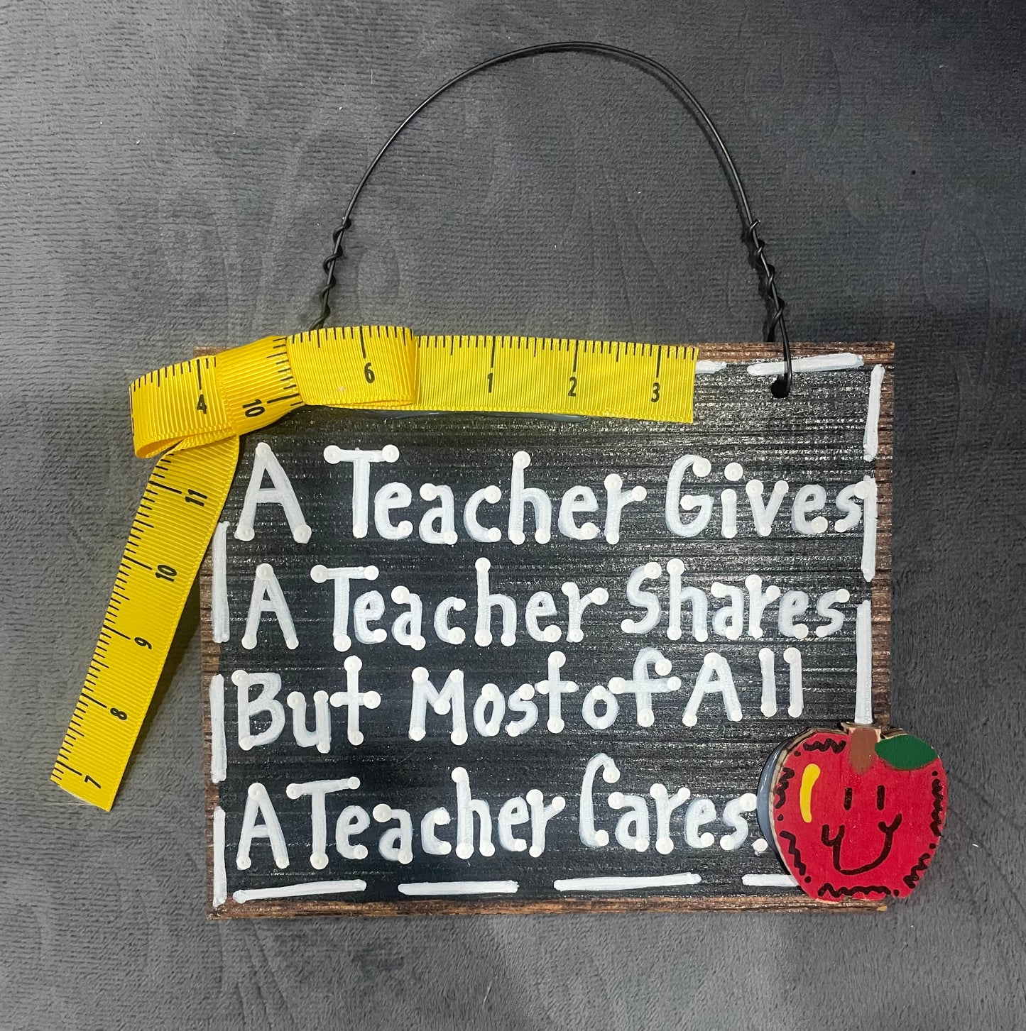 Teacher give, shares, cares Wall Hanger